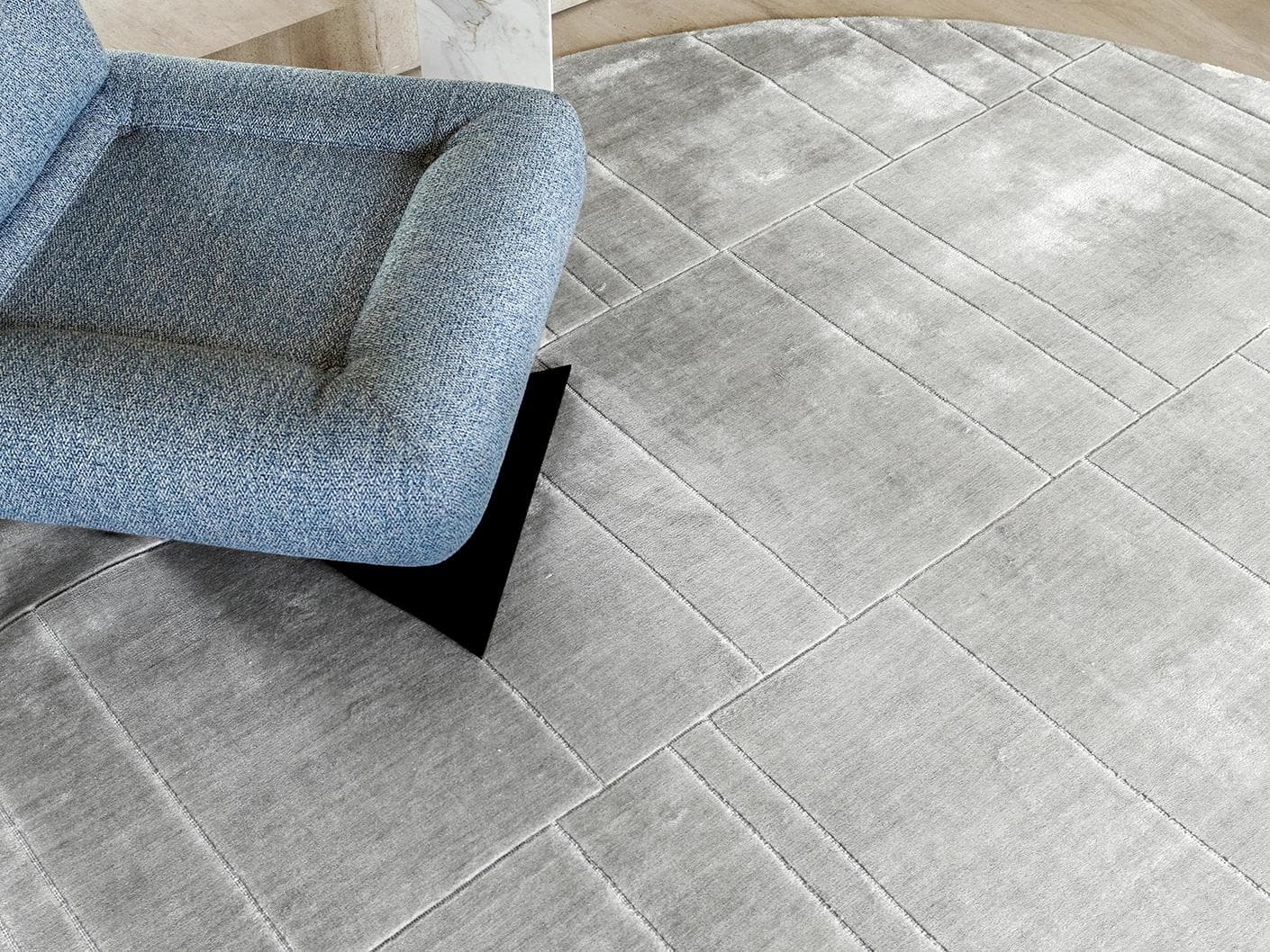Elliot Ashton carpets in grey and silver, shown in a lifestyle close-up top view as image 1