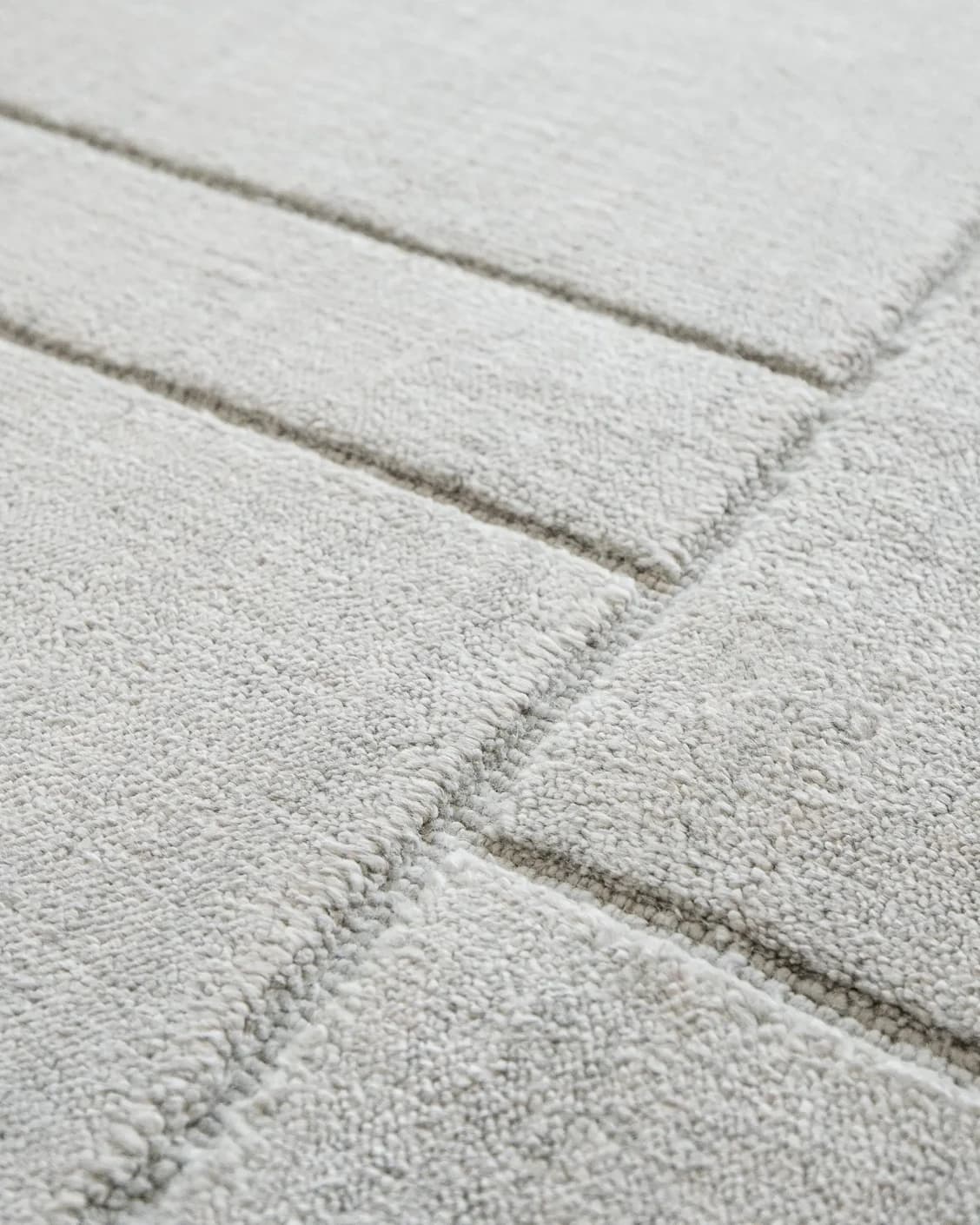Elliot Ashton carpet in grey and silver, shown in a product close-up as image 10