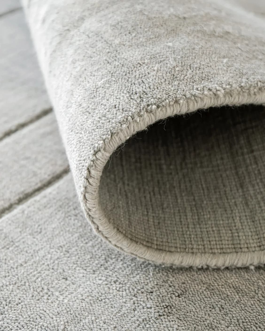 Elliot Ashton carpet in grey and silver, shown in a product close-up as image 12