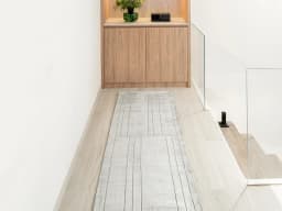 Elliot Ashton Runners carpet in grey and silver, shown in a lifestyle front view