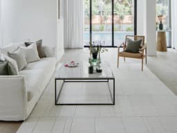 Elliot Bianca carpet in white and pearl, shown in a lifestyle front view