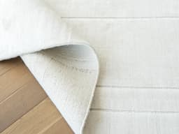 Elliot Bianca Runners carpet in white and pearl, shown in a lifestyle front view