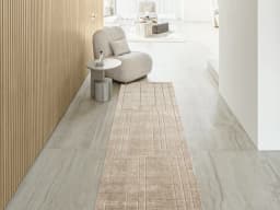 Elliot Sandy Runners carpet in sandy, beige and taupe, shown in a lifestyle front view