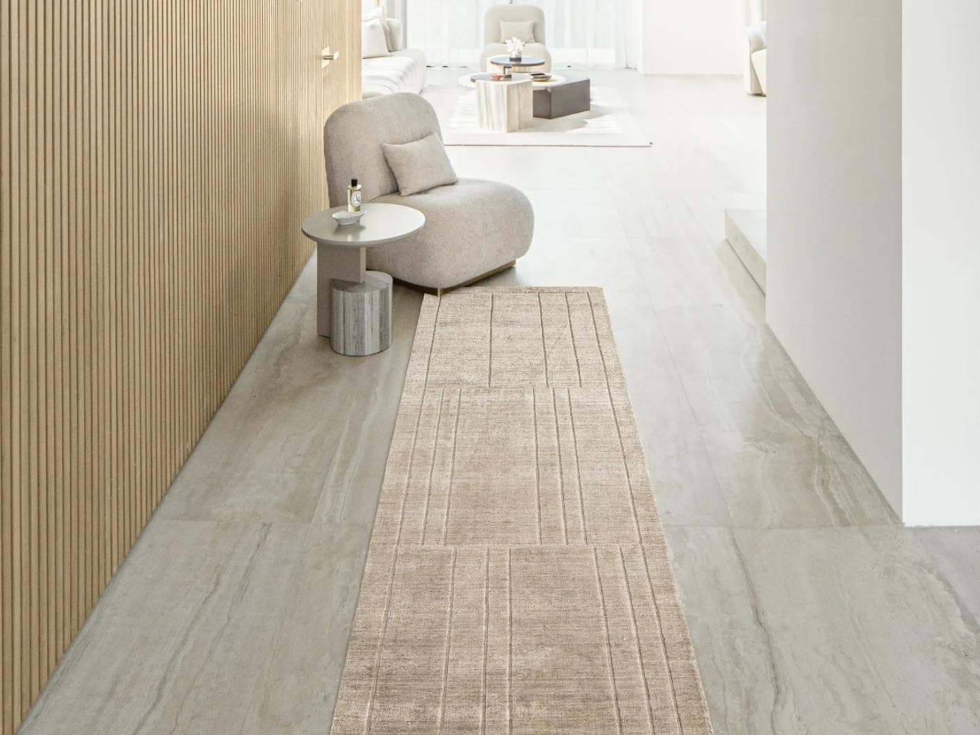 Elliot Sandy carpets in beige and taupe, shown in a lifestyle front view as image 3