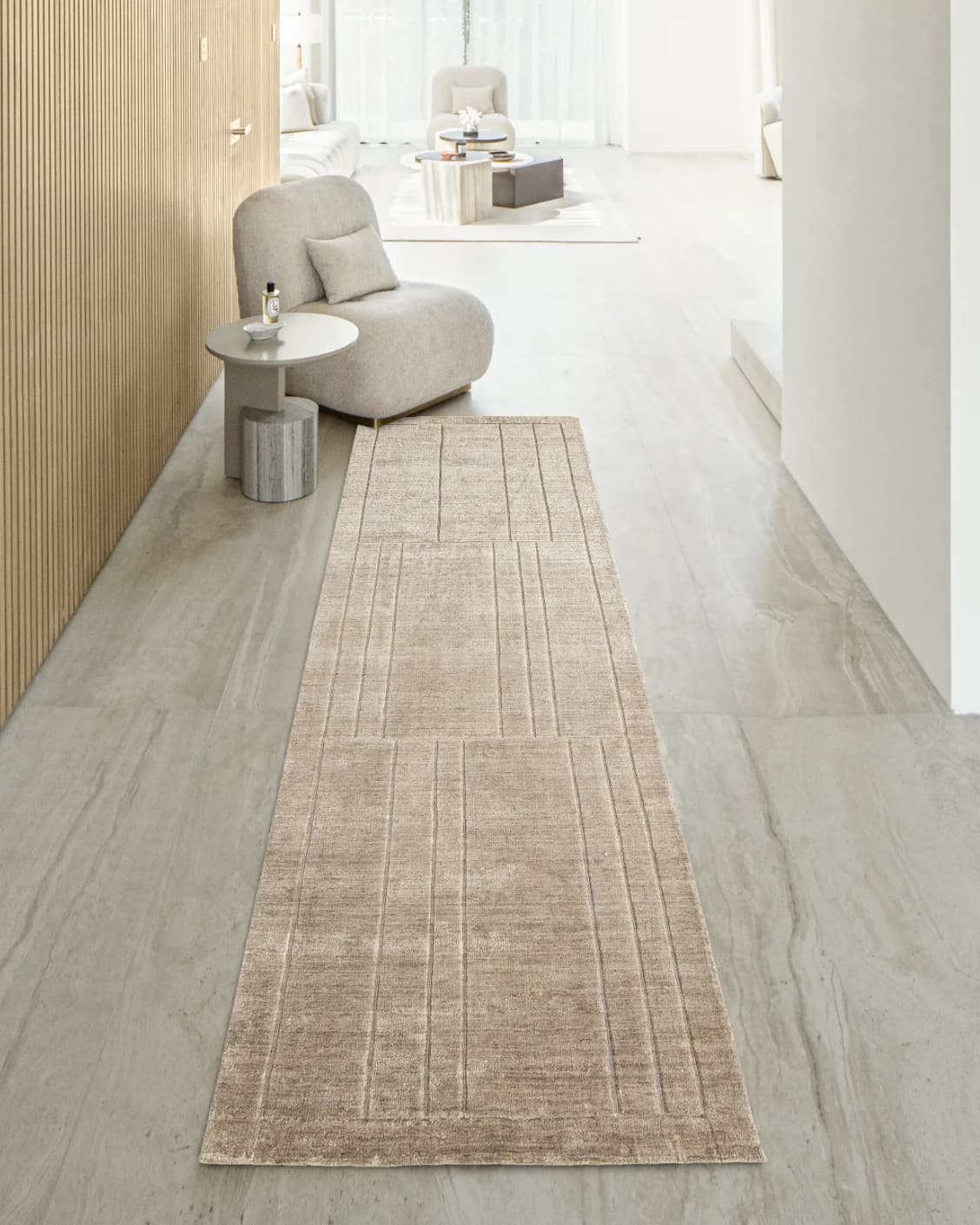 Elliot Sandy carpet in beige and taupe, shown in a lifestyle front view as image 6