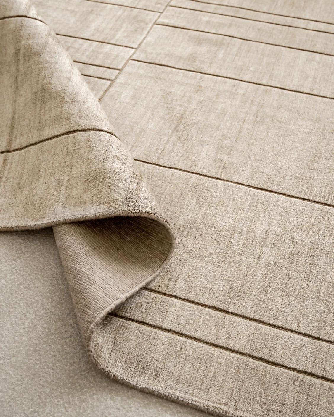 Elliot Sandy carpet in beige and taupe, shown in a product top view as image 14