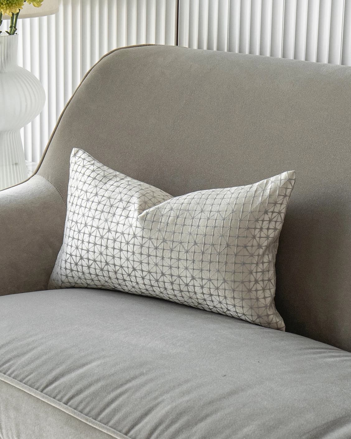 Elmas Klimt II cushion in silver and white, shown in a lifestyle front view as image 2