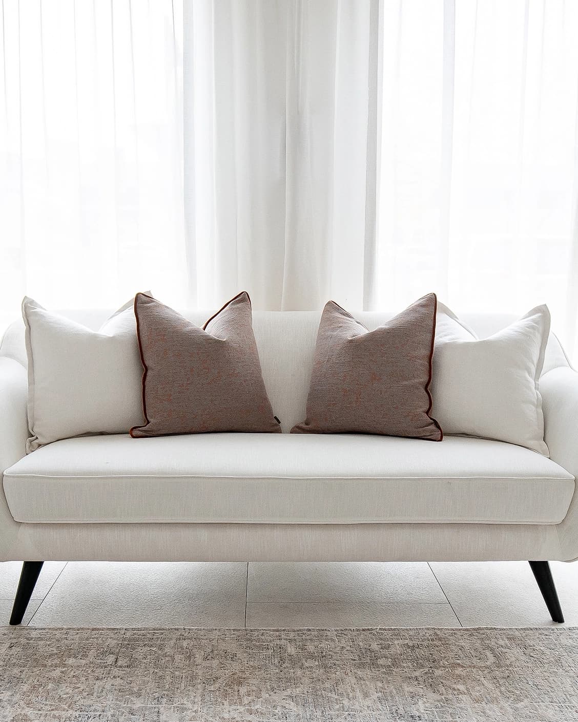 Eloise Bundle bundle - indoor in white and orange, shown in a lifestyle front view as image 1