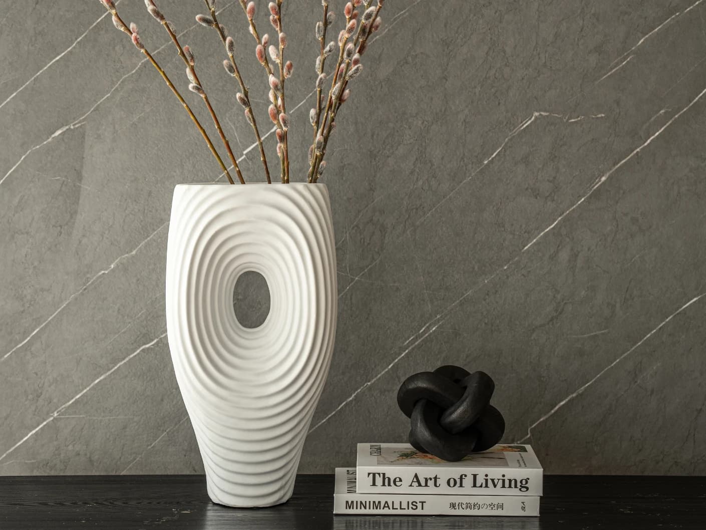 Elvia Arneson vases in white, shown in a lifestyle front view