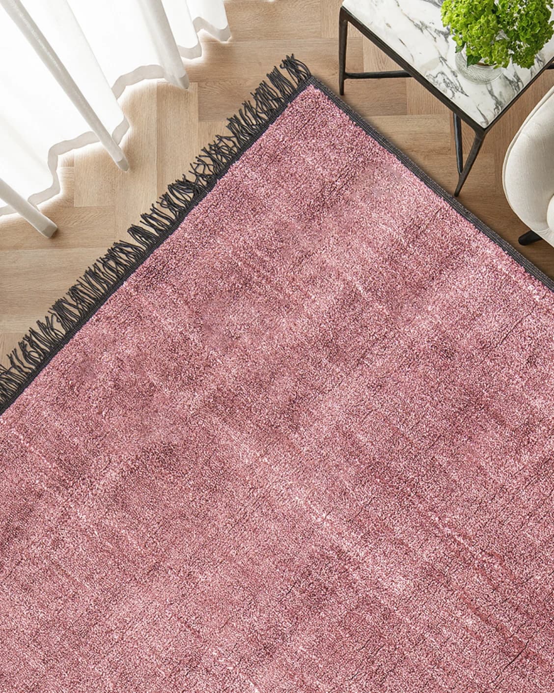 Elyse Rosso carpet in pink, shown in a lifestyle top view as image 2