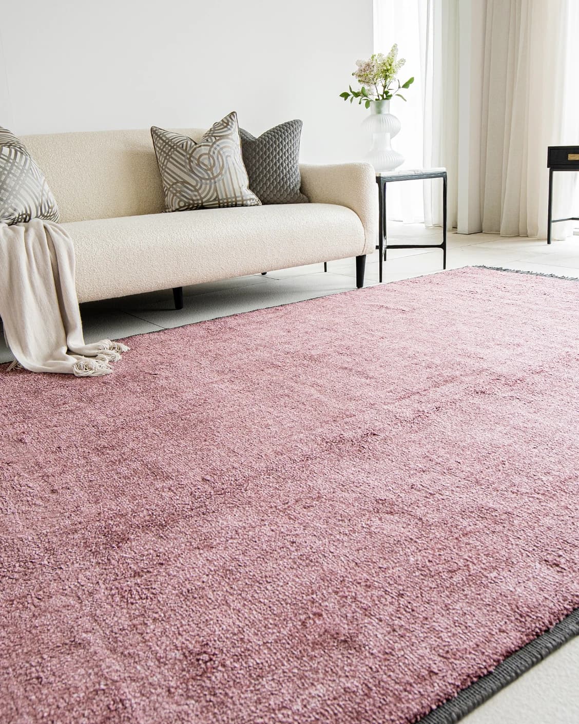 Elyse Rosso carpets in pink, shown in a lifestyle left view as image 3