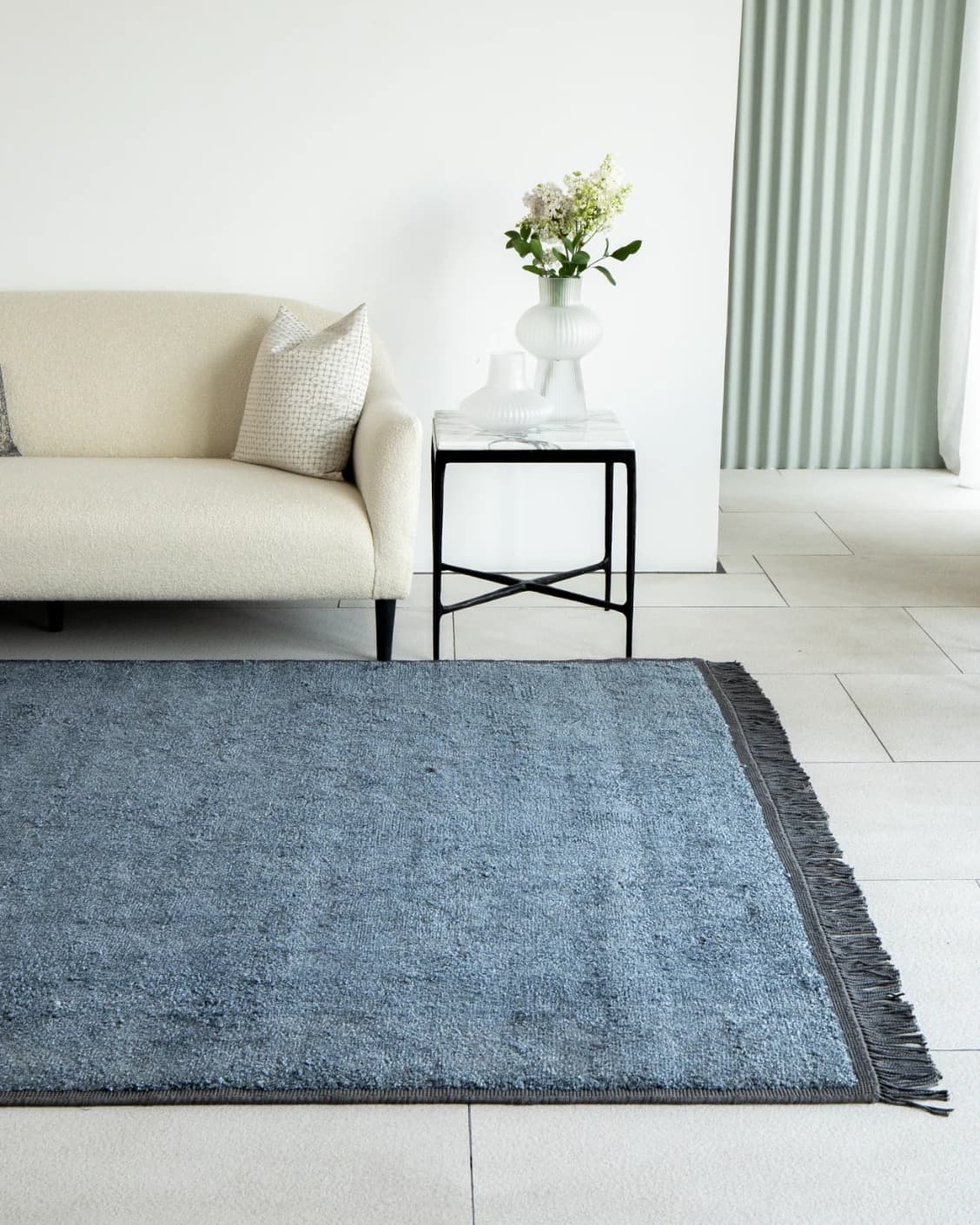 Elyse Sky carpets in blue, shown in a lifestyle front view as image 1