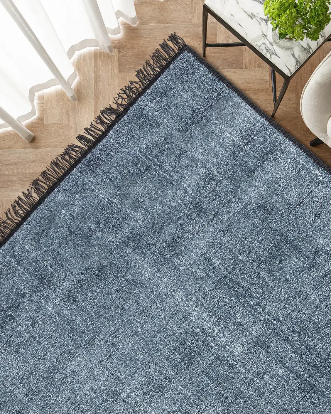 Elyse Sky carpet in sky and blue, shown in a lifestyle top view as image 2