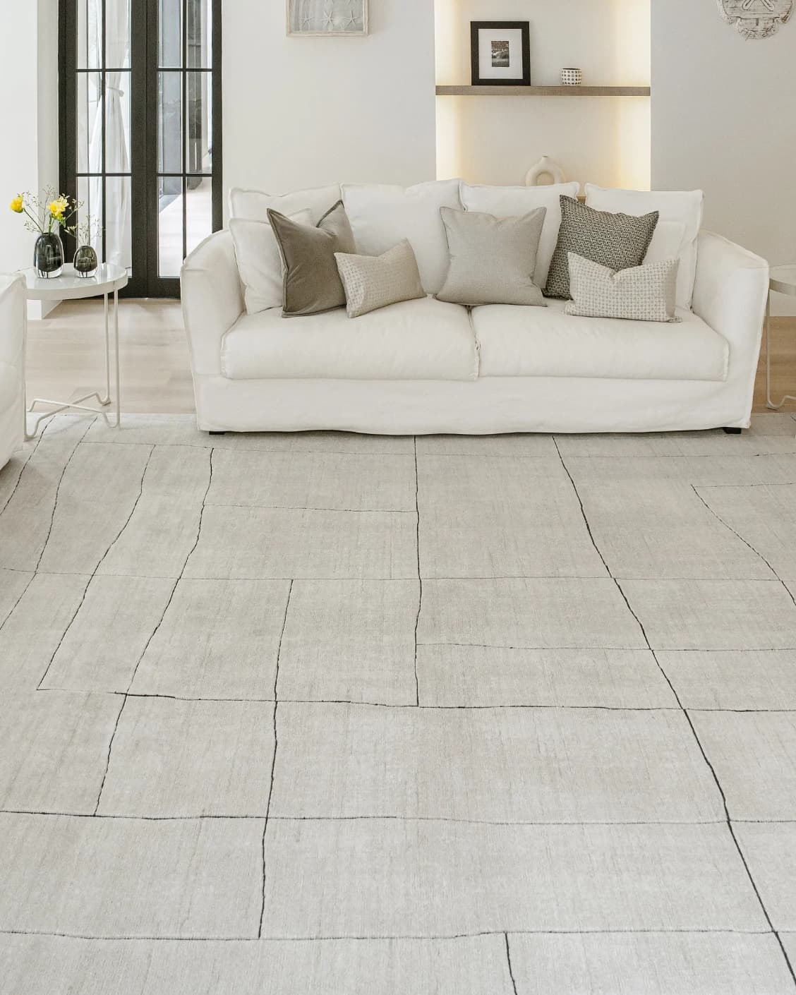 Emme Bianca carpet in off white, shown in a lifestyle front view as image 6