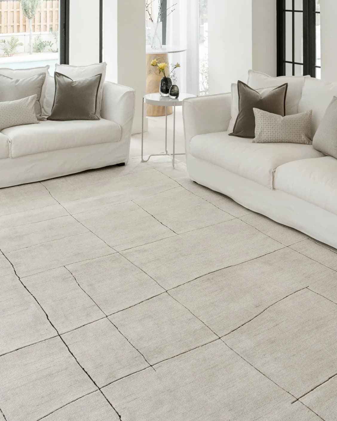 Emme Bianca carpet in off white, shown in a lifestyle right view as image 8