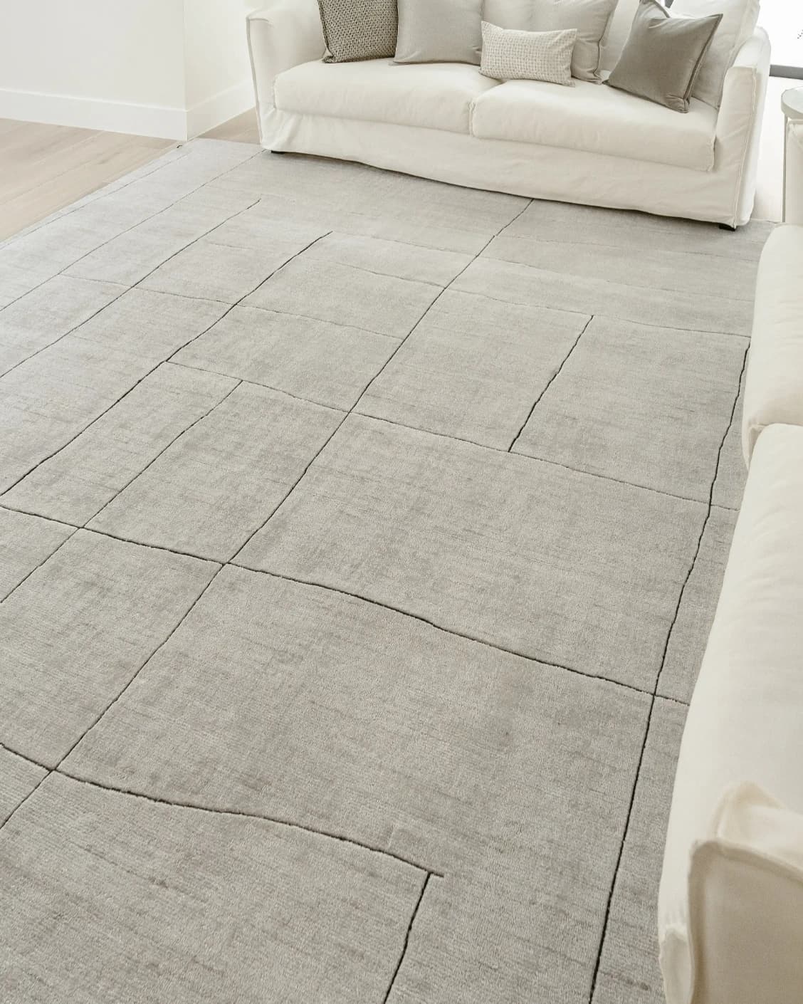 Emme Bianca carpet in off white, shown in a lifestyle right view as image 9