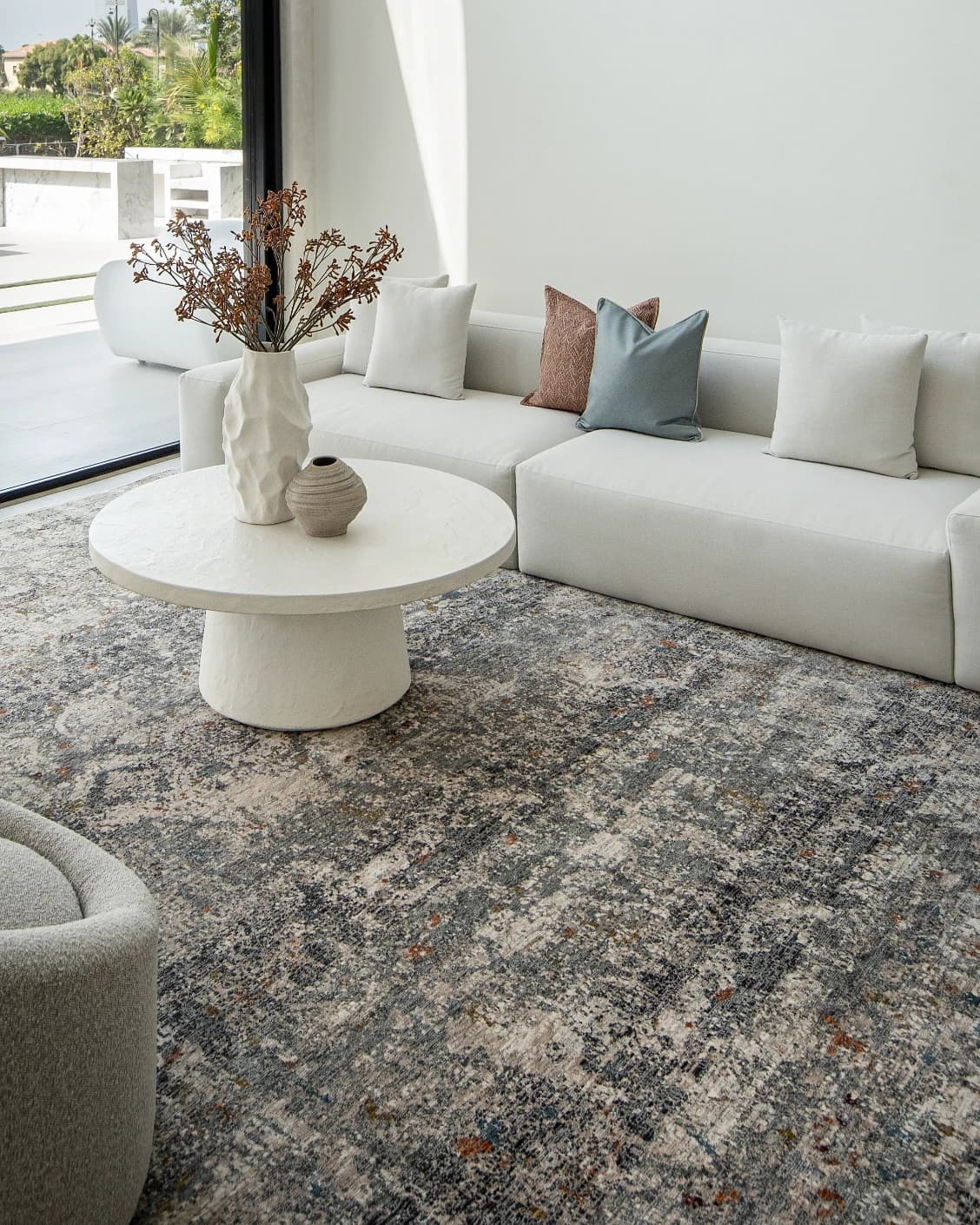 Ethan Ashton carpet in grey and beige, shown in a lifestyle front view as image 5