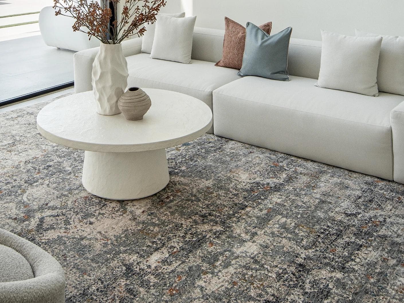 Ethan Ashton carpet in grey and beige, shown in a lifestyle front view as image 5