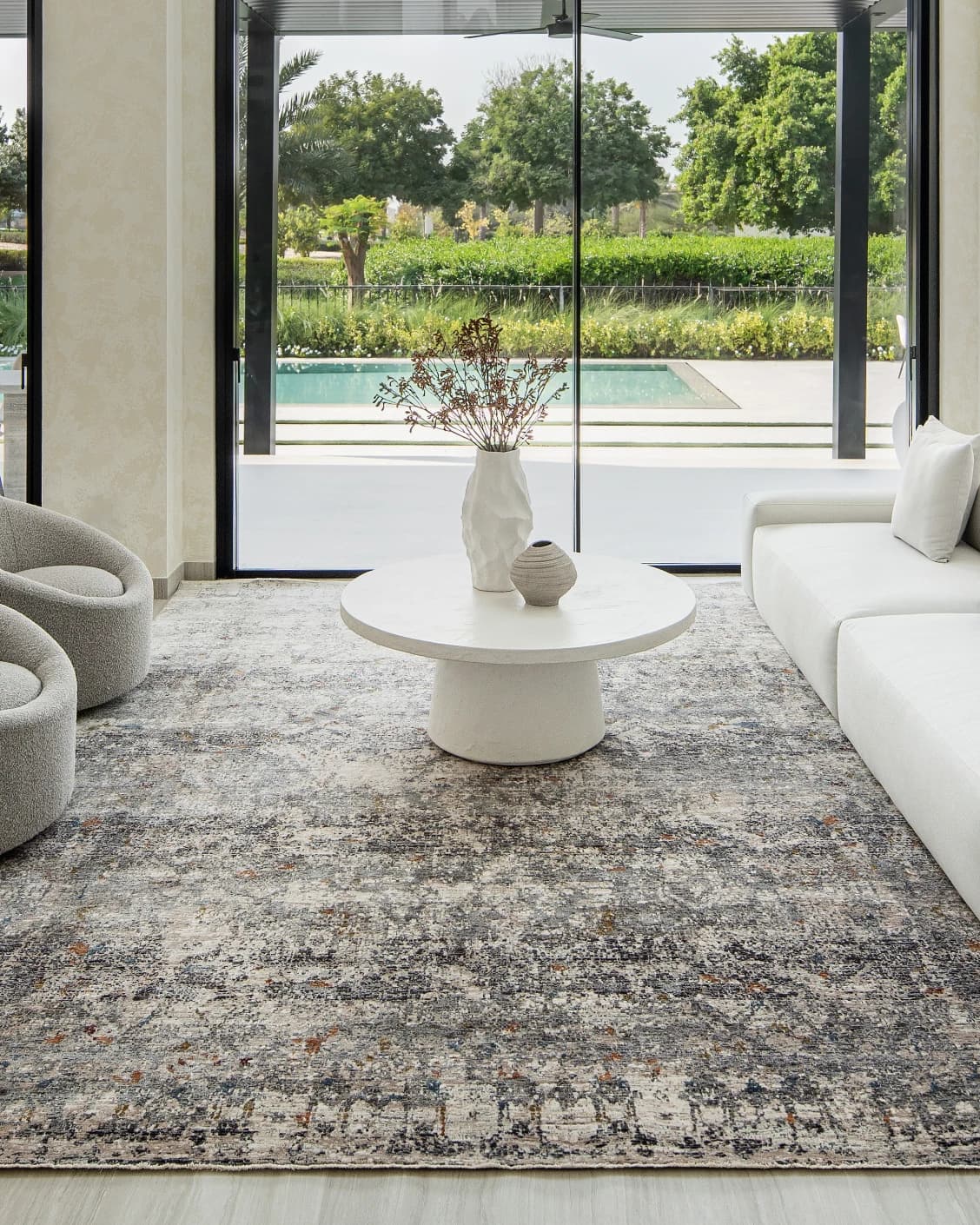 Ethan Ashton carpet in grey and beige, shown in a lifestyle front view as image 6