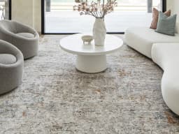 Ethan Brick carpet in gold and grey, shown in a lifestyle front view