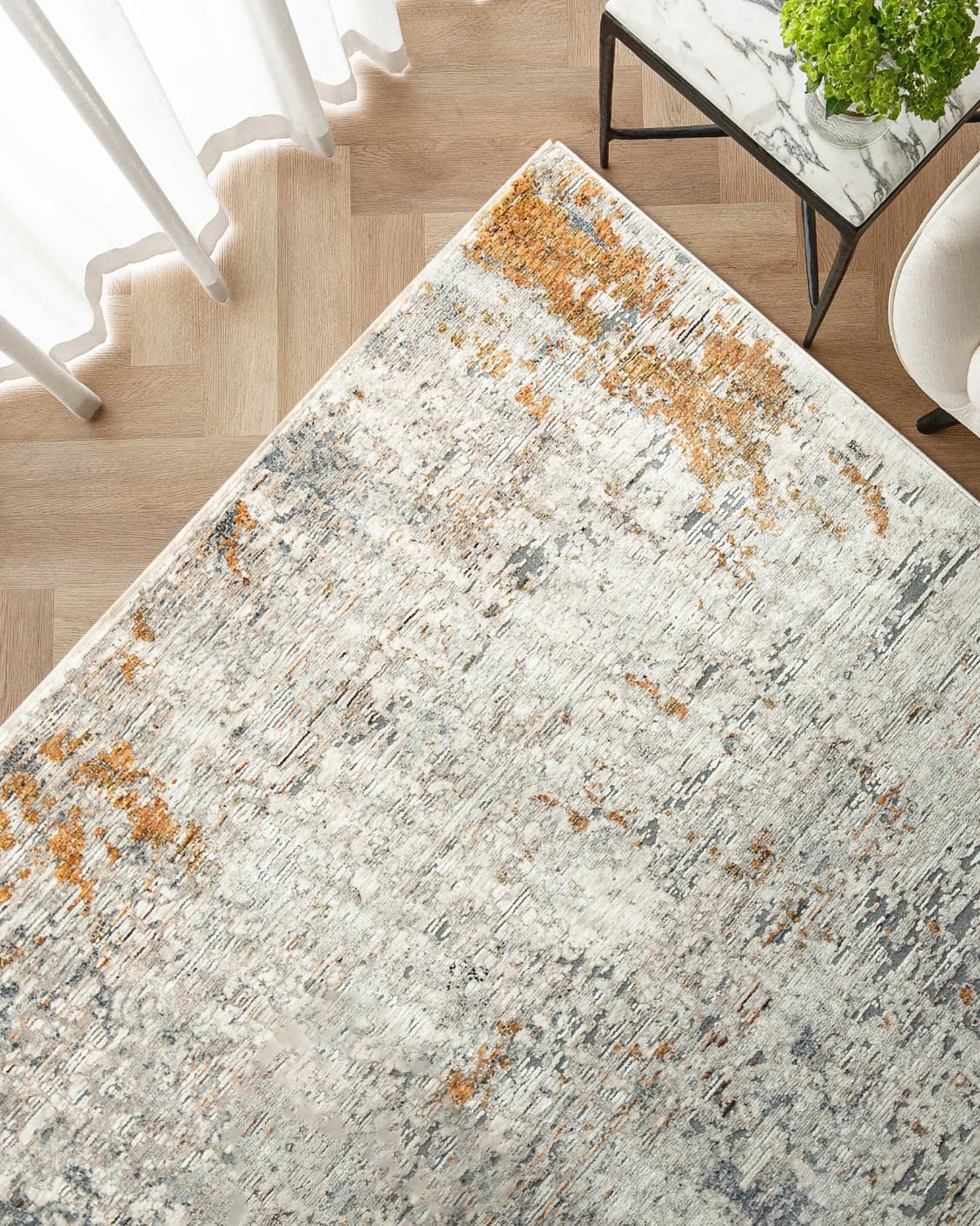 Ethan Brick carpet in gold and grey, shown in a lifestyle top view as image 2