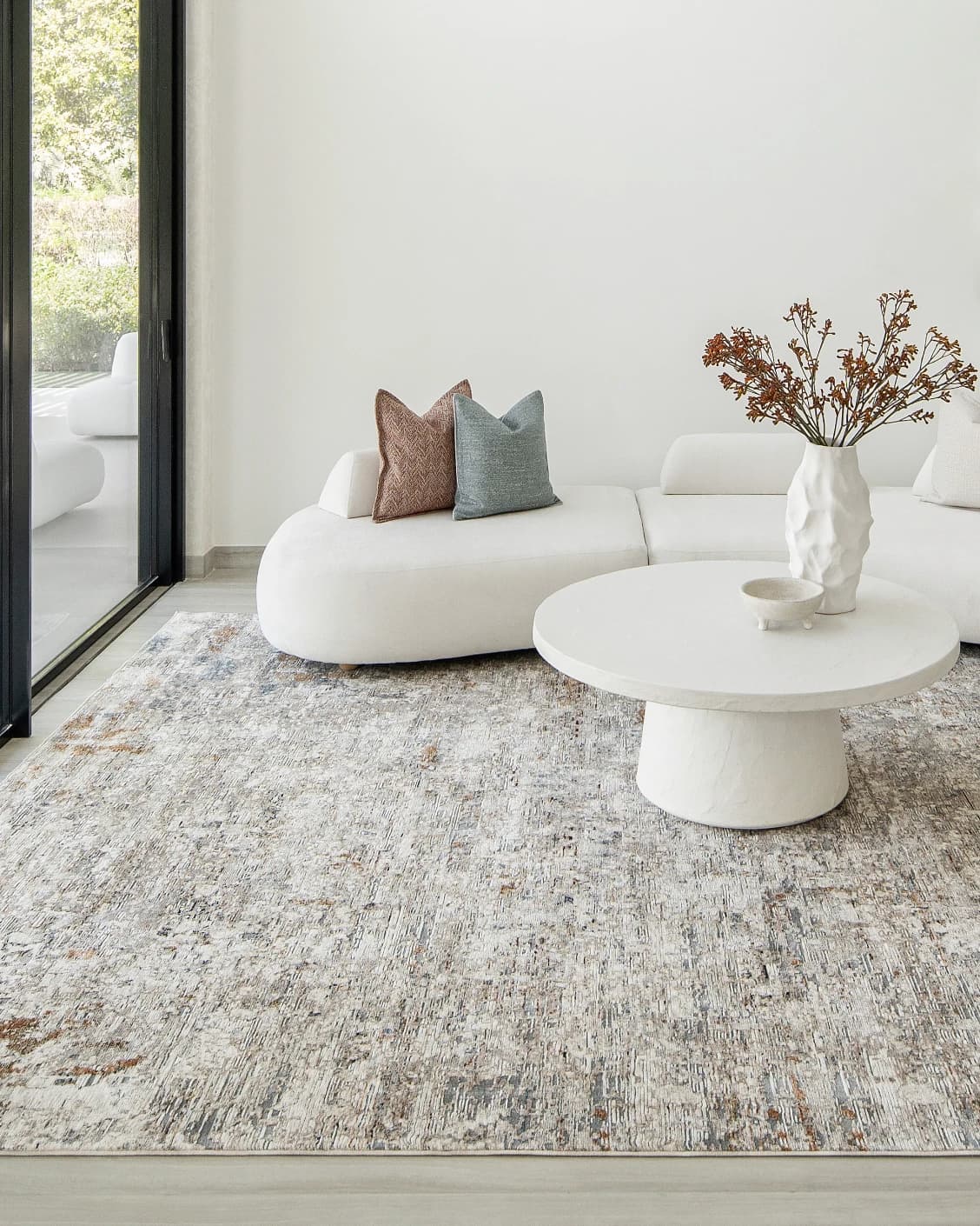Ethan Brick carpet in gold and grey, shown in a lifestyle front view as image 6