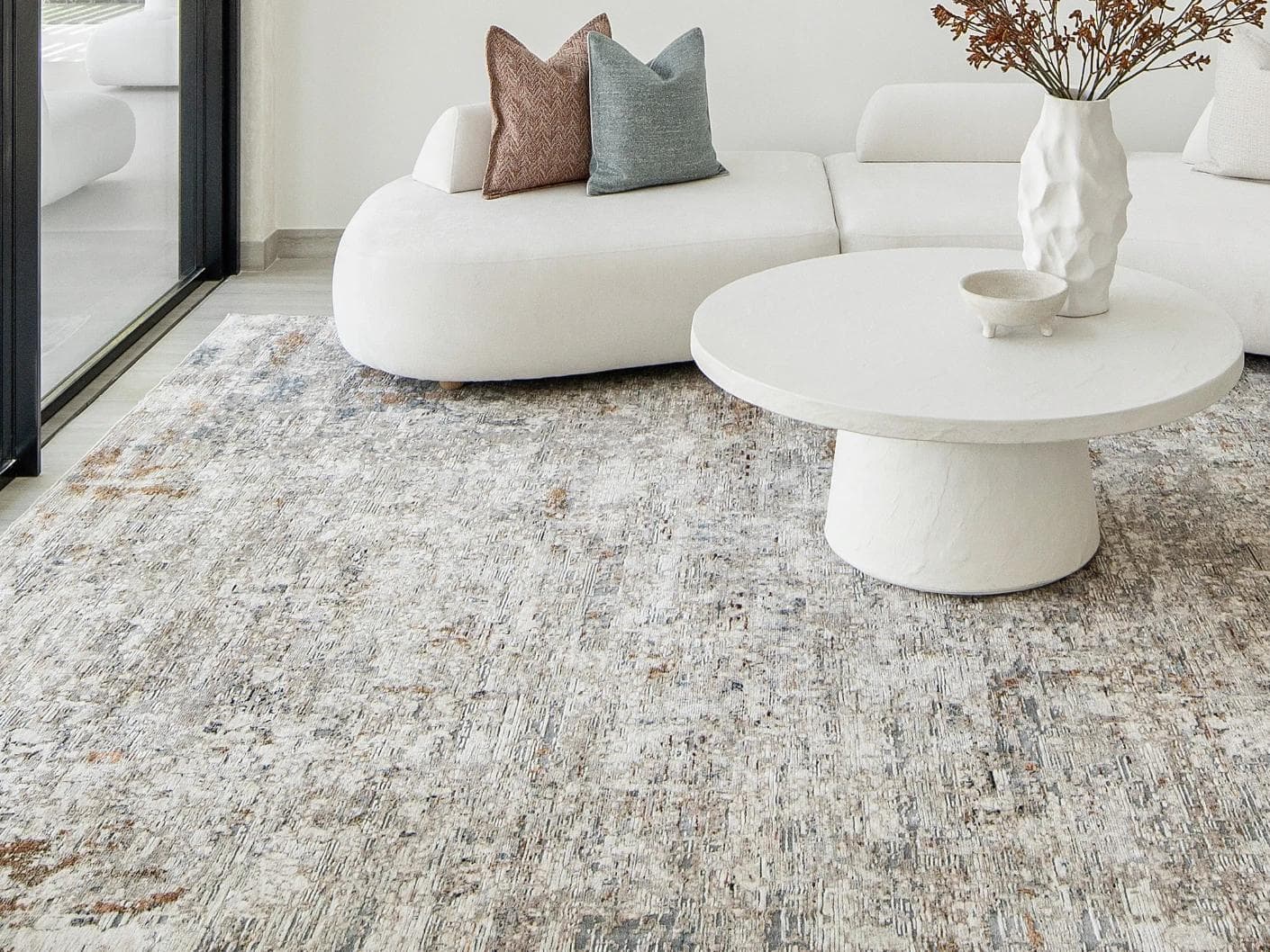 Ethan Brick carpets in gold and grey, shown in a lifestyle front view as image 3