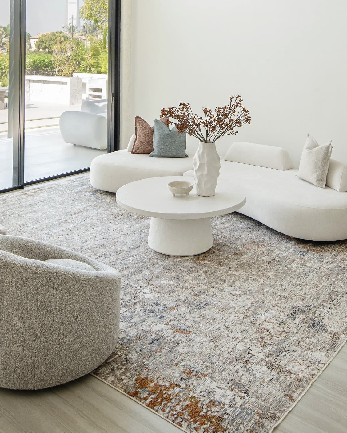 Ethan Brick carpet in gold and grey, shown in a lifestyle right view as image 7