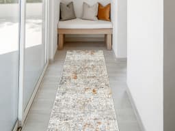 Ethan Brick Runners carpet in gold and grey, shown in a lifestyle front view