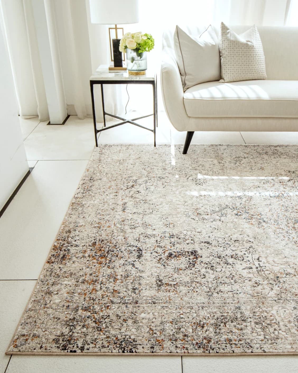 Ethan Dune II carpet in dune, grey, beige and multicolour, shown in a lifestyle front view