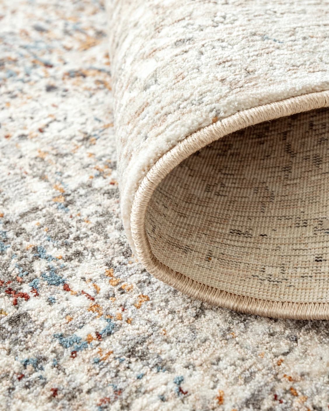 Ethan Dune II carpets in grey, beige and multicolour, shown in a product close-up as image 1