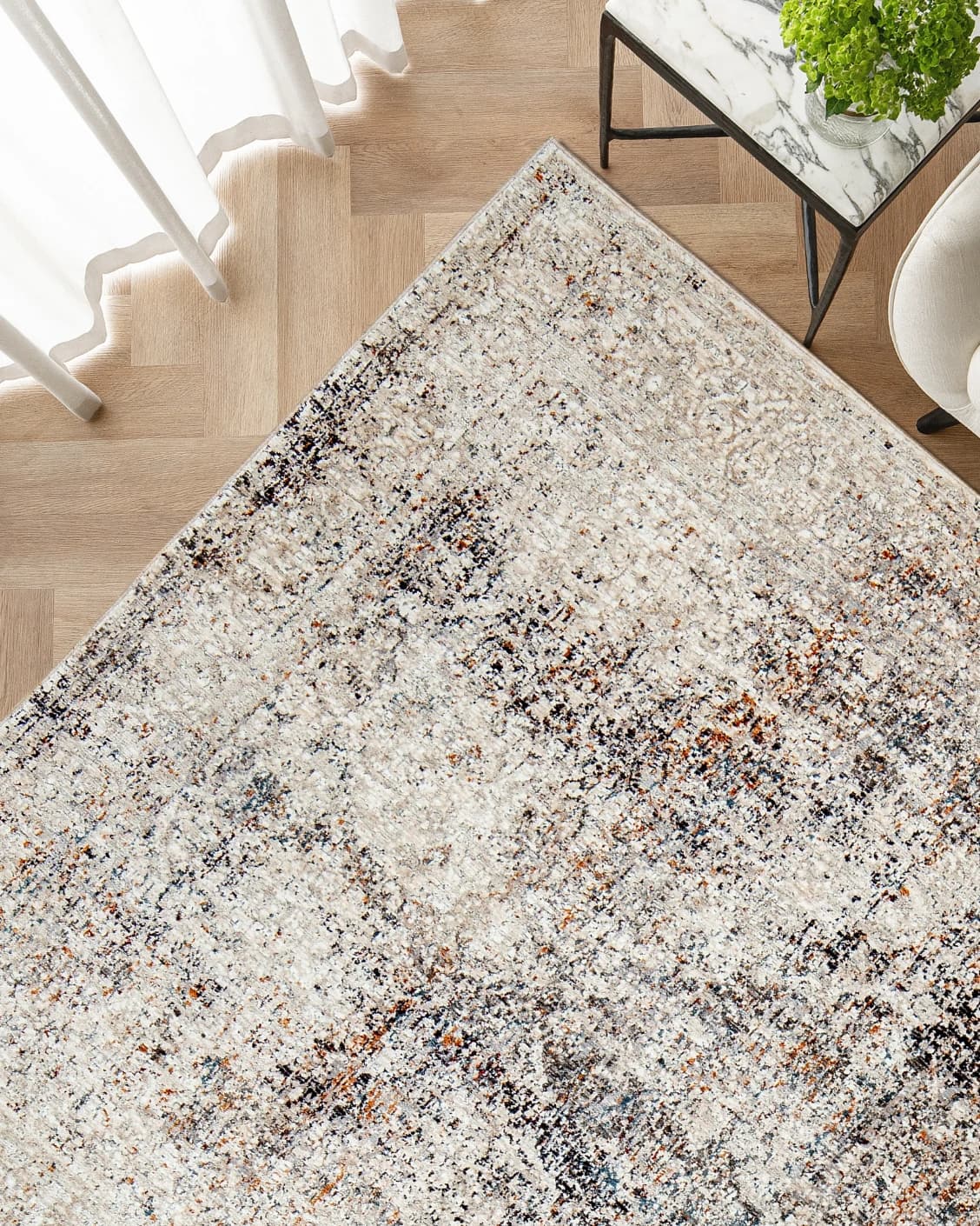 Ethan Dune II carpet in dune, grey, beige and multicolour, shown in a lifestyle top view as image 2