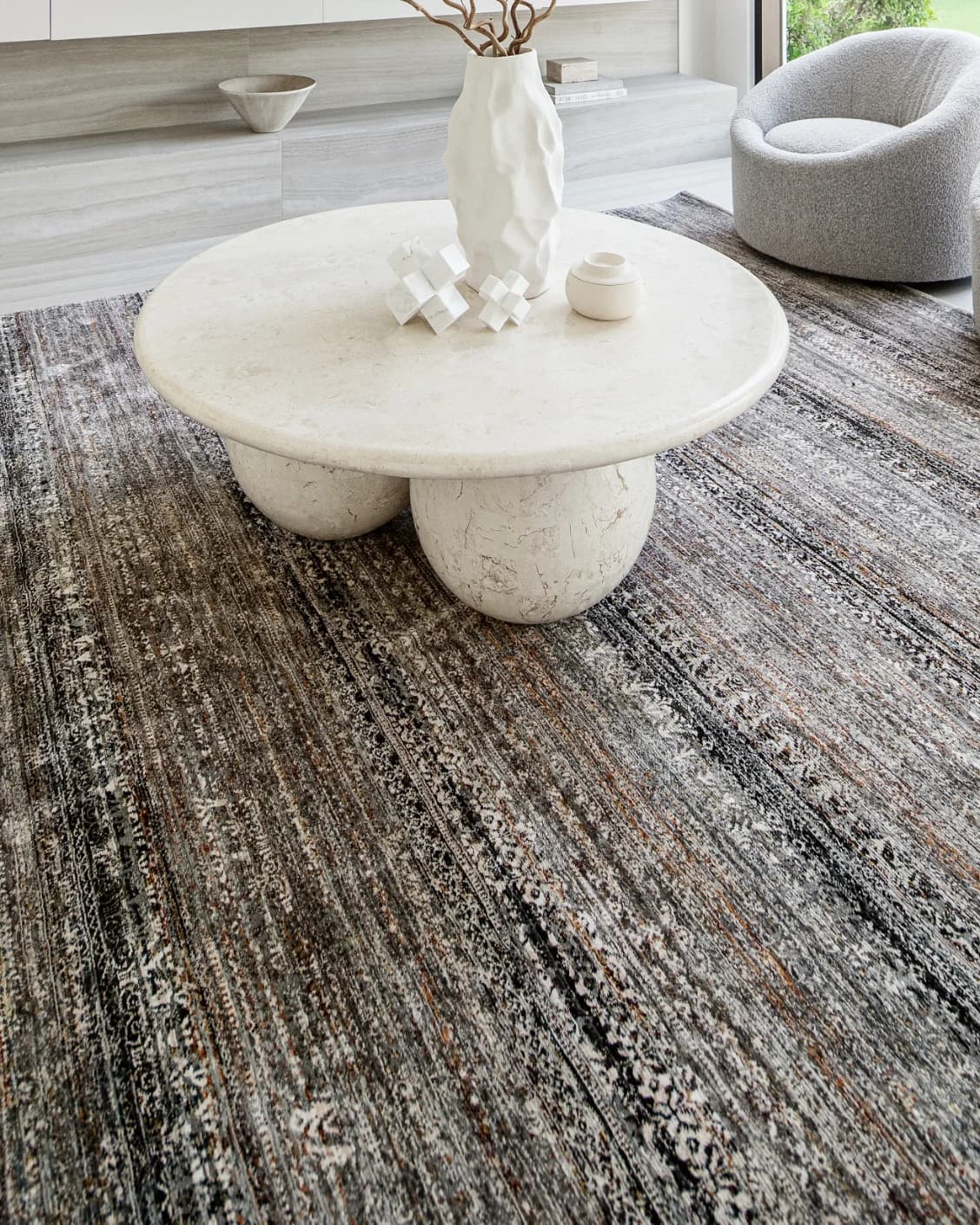 Ethan Ebony carpet in grey, shown in a lifestyle close-up as image 4