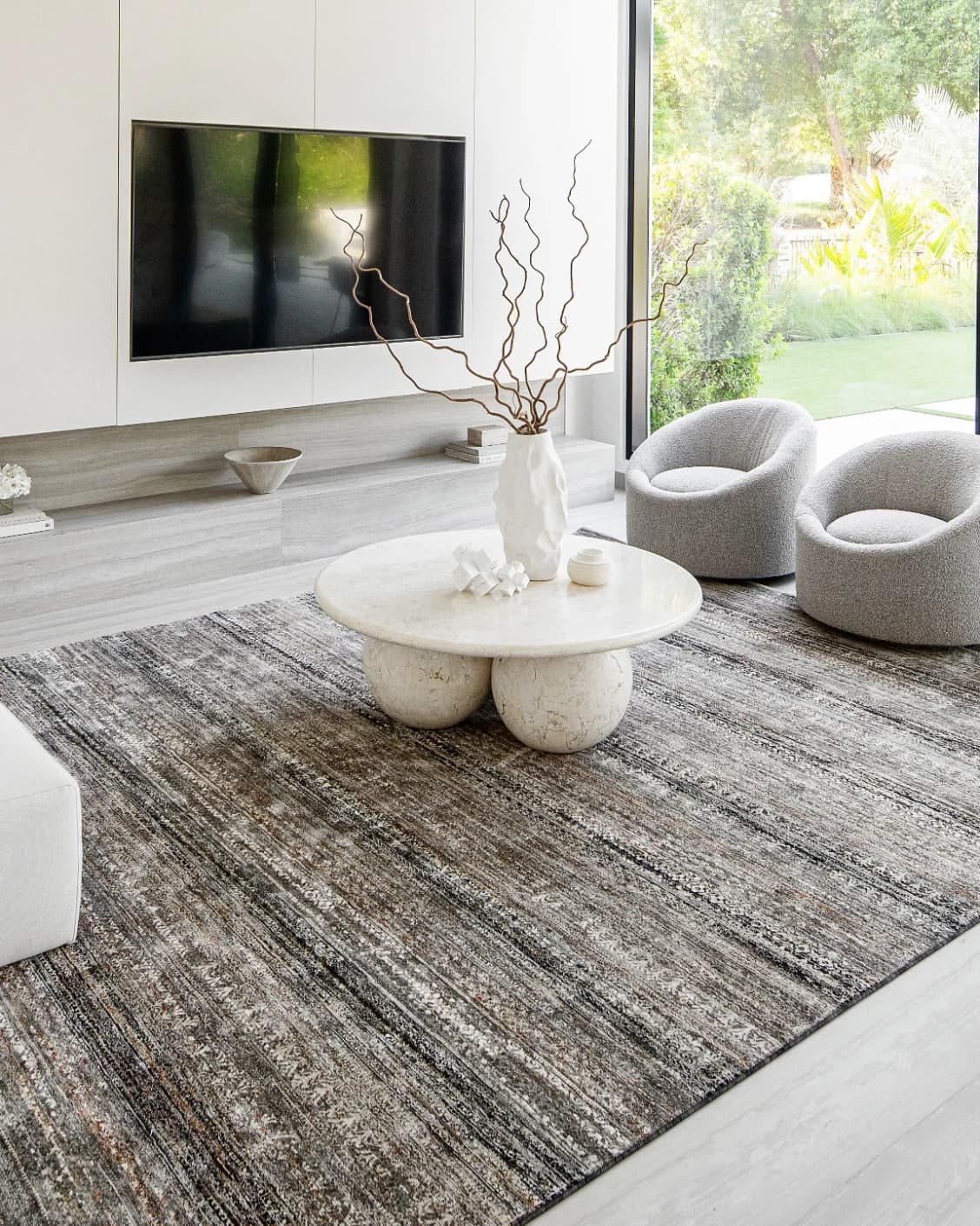Ethan Ebony carpet in grey, shown in a lifestyle right view as image 8