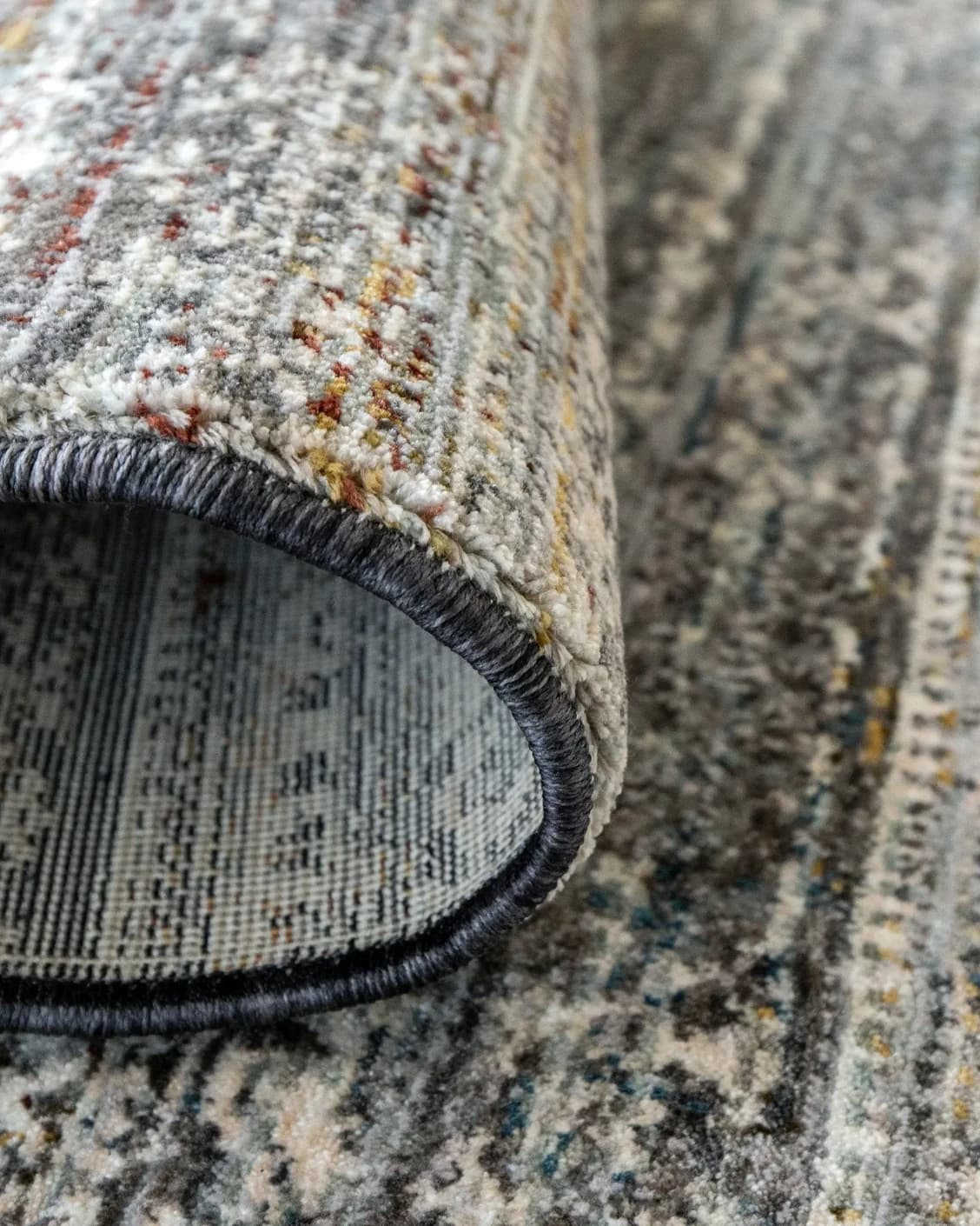 Ethan Ebony carpet in grey, shown in a product close-up as image 11