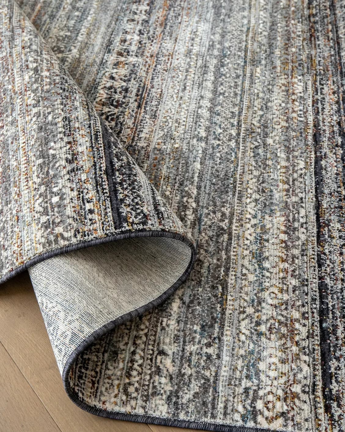 Ethan Ebony carpet in grey, shown in a product close-up as image 12