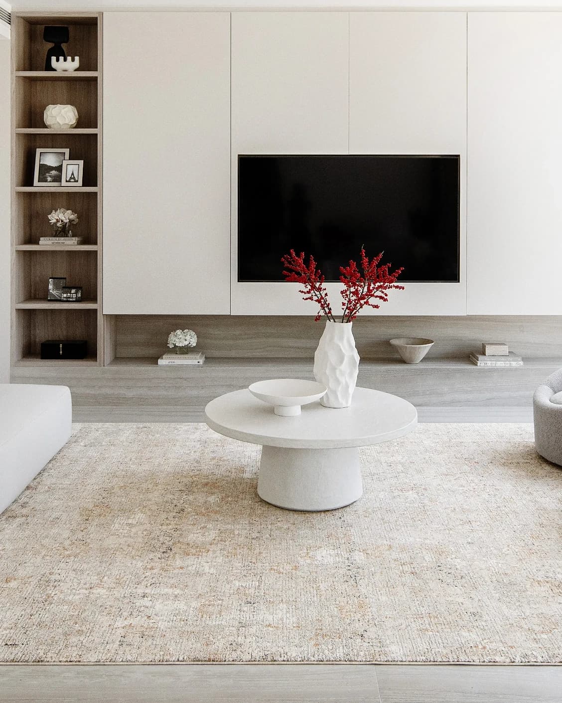 Ethan Goldberg carpet in rust, grey and gold, shown in a lifestyle front view as image 5