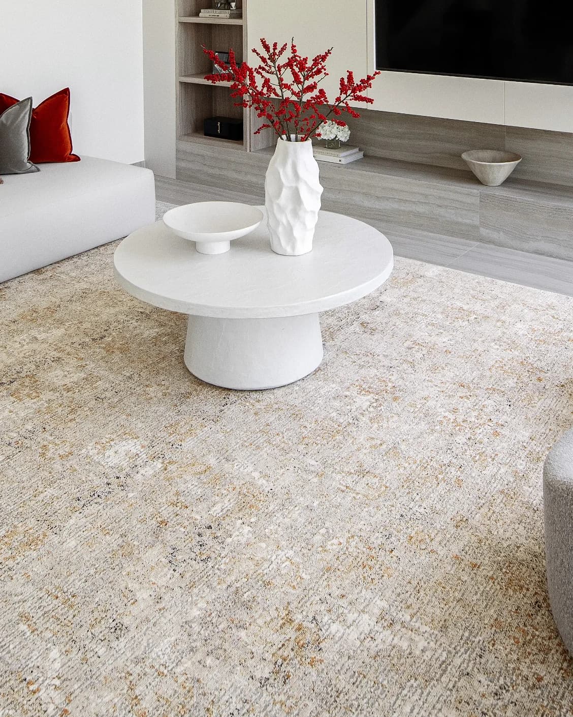 Ethan Goldberg carpet in rust, grey and gold, shown in a lifestyle right view as image 8