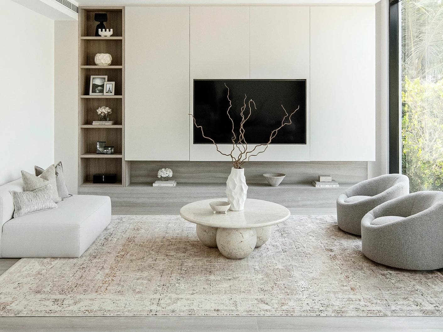 Ethan Martin carpet in beige and grey, shown in a lifestyle front view as image 5
