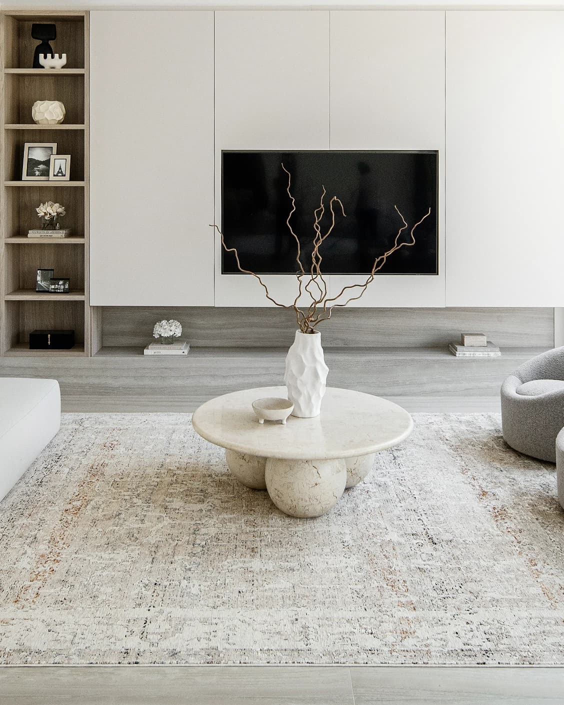 Ethan Martin carpet in beige and grey, shown in a lifestyle front view as image 6