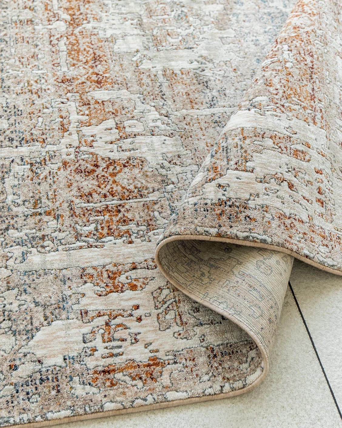 Ethan Martin carpet in beige and grey, shown in a product close-up as image 9