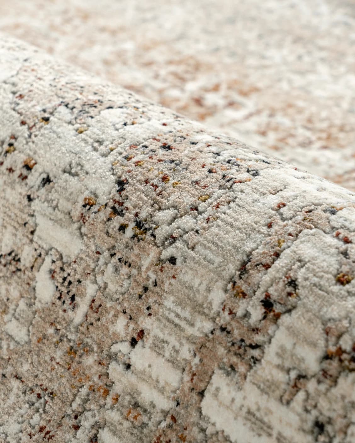 Ethan Martin carpet in beige and grey, shown in a product close-up as image 10