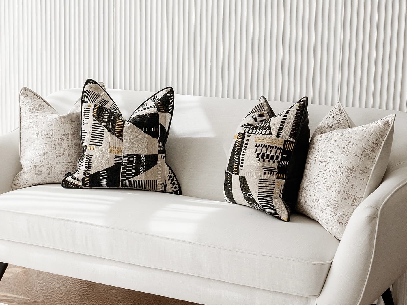 Fabron Bundle bundle cushions, shown in a lifestyle front view