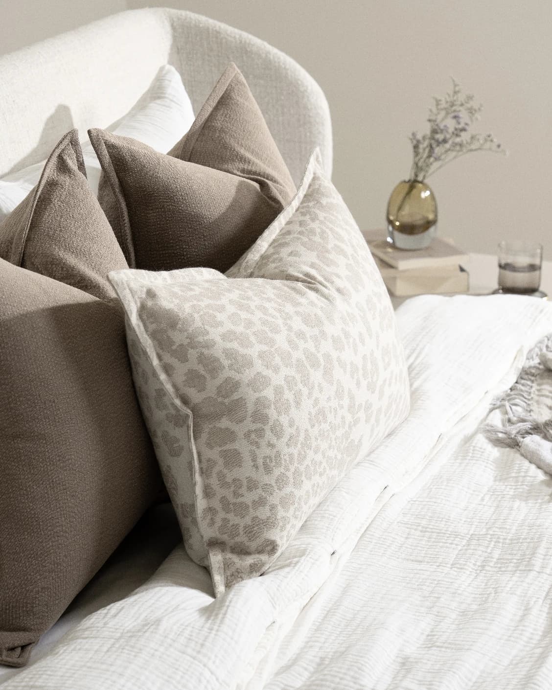 Fidha Bundle cushion in beige, shown in a lifestyle left view as image 7