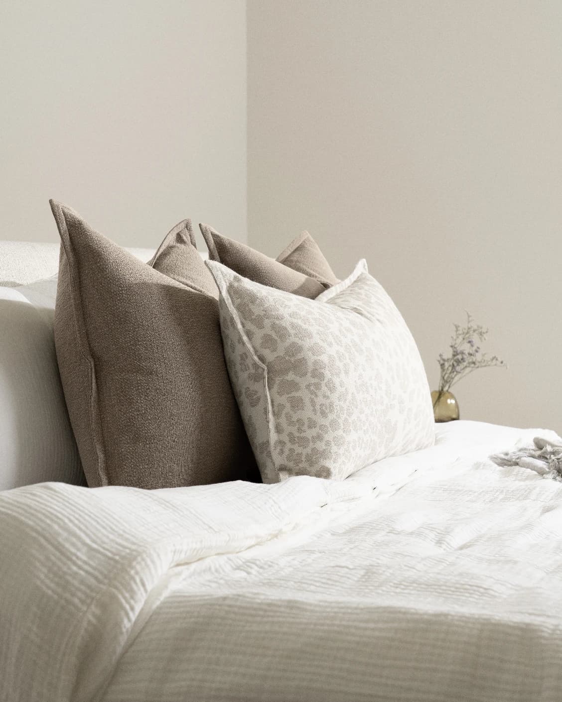 Fidha Bundle cushion in beige, shown in a lifestyle left view as image 6