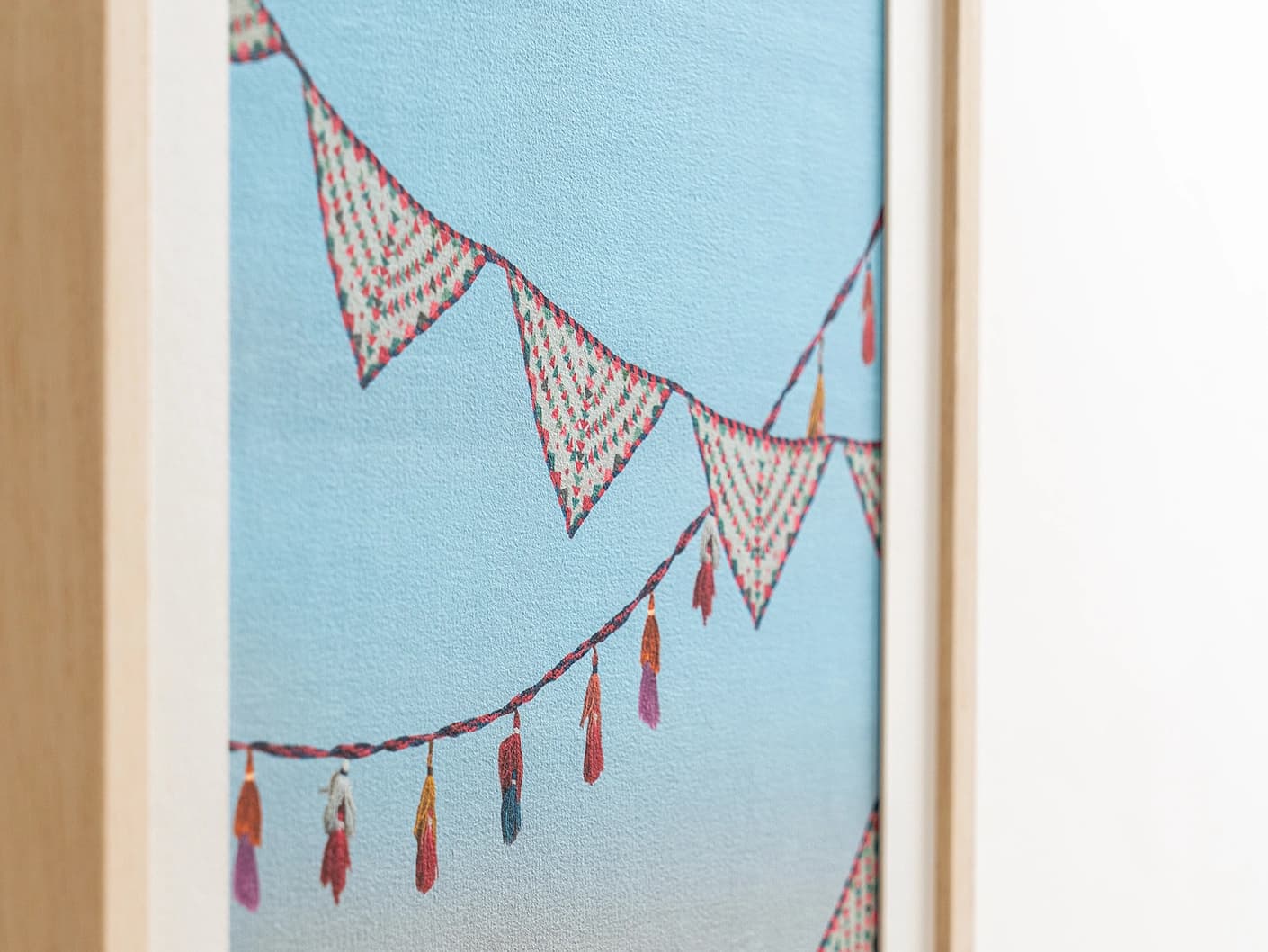 Fiesta fine art print in blue, shown in a lifestyle close-up view as image 2