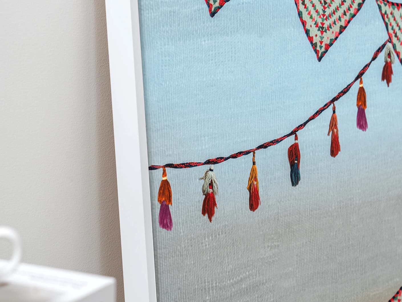 Fiesta canvas in multicolour and blue, shown in a lifestyle close-up as image 2