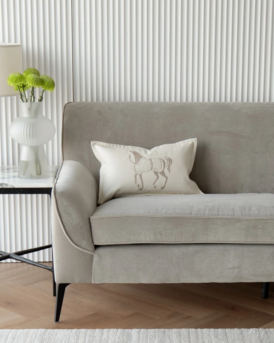 Filip Caravaggio cushion in white, shown in a lifestyle front view as image 4