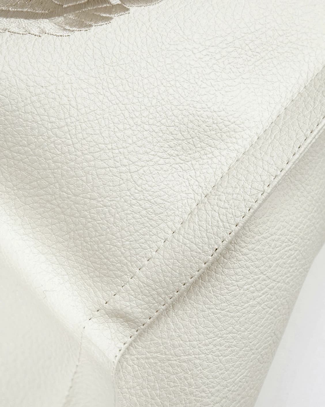 Filip Caravaggio cushion in white, shown in a product close-up as image 7