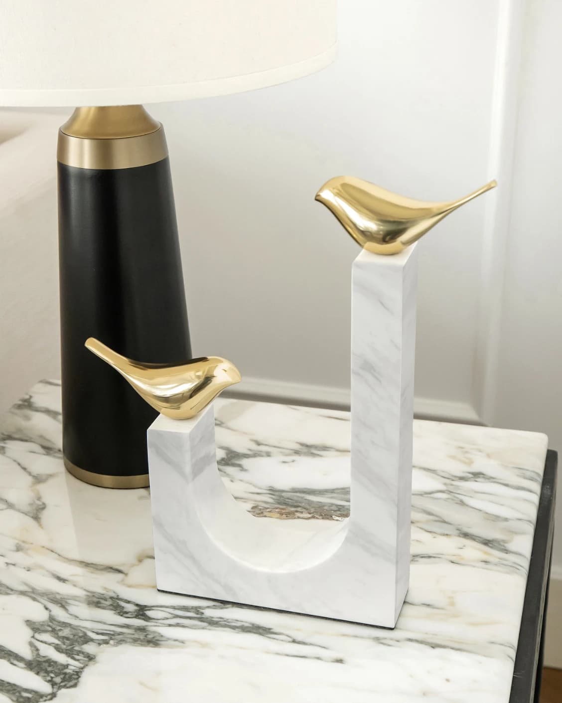 Finch Butterfield statues and sculptures in white and gold, shown in a lifestyle right view as image 2